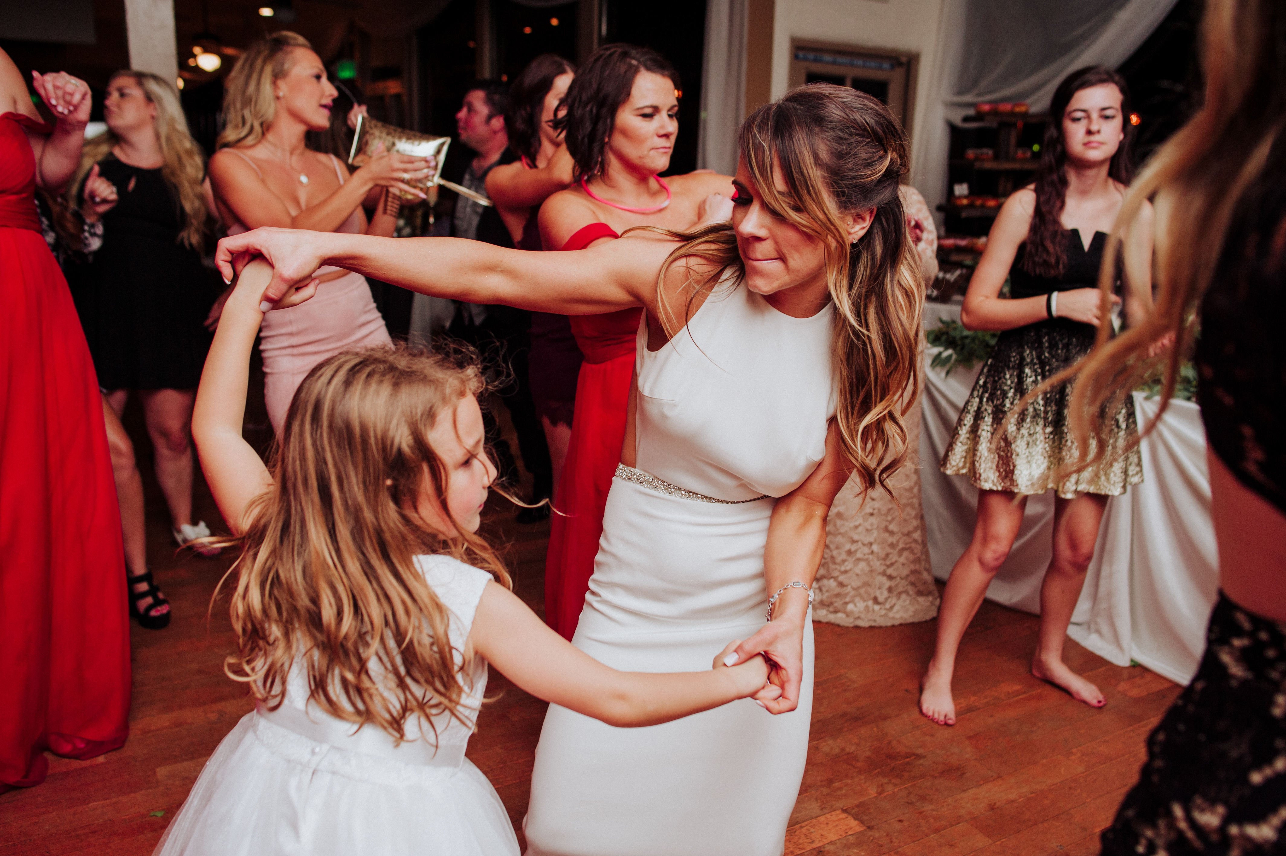 Bride dancing with her flower girlat a Romantic Style San Diego Wedding at Marina Village by Kylie Rae Photography