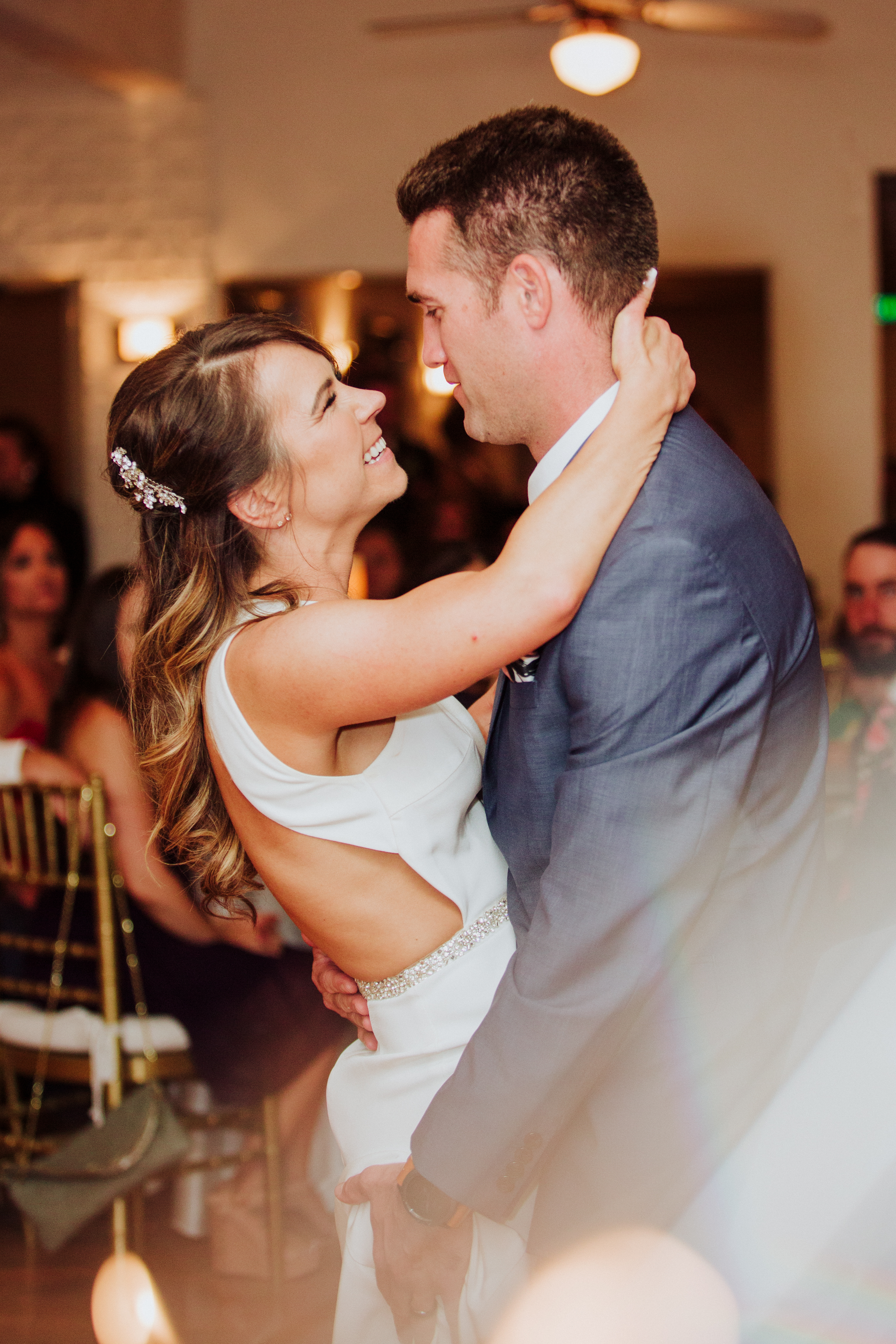 Bride and groom first danceat a Romantic Style San Diego Wedding at Marina Village by Kylie Rae Photography