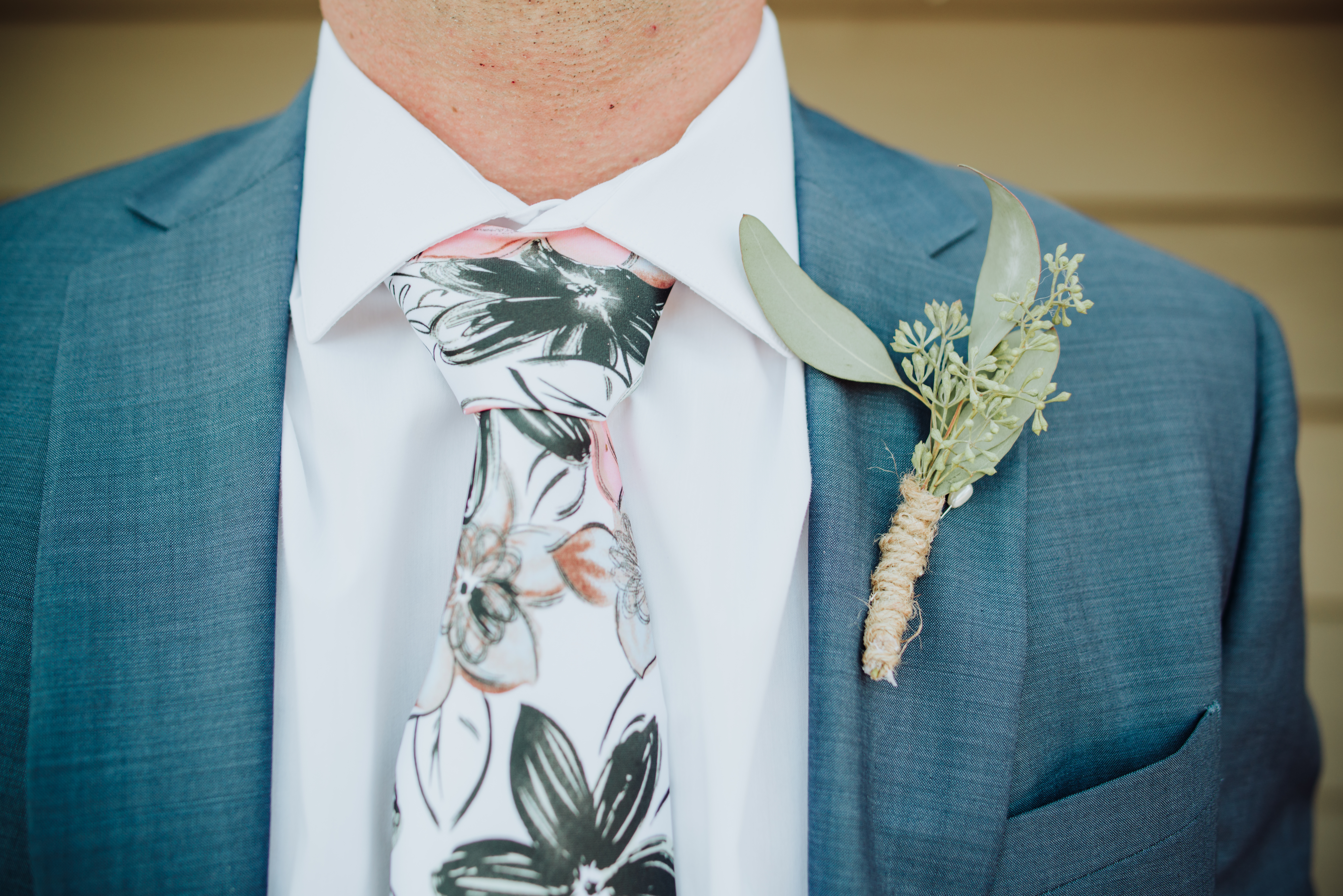Groom's floral tieat a Romantic Style San Diego Wedding at Marina Village by Kylie Rae Photography
