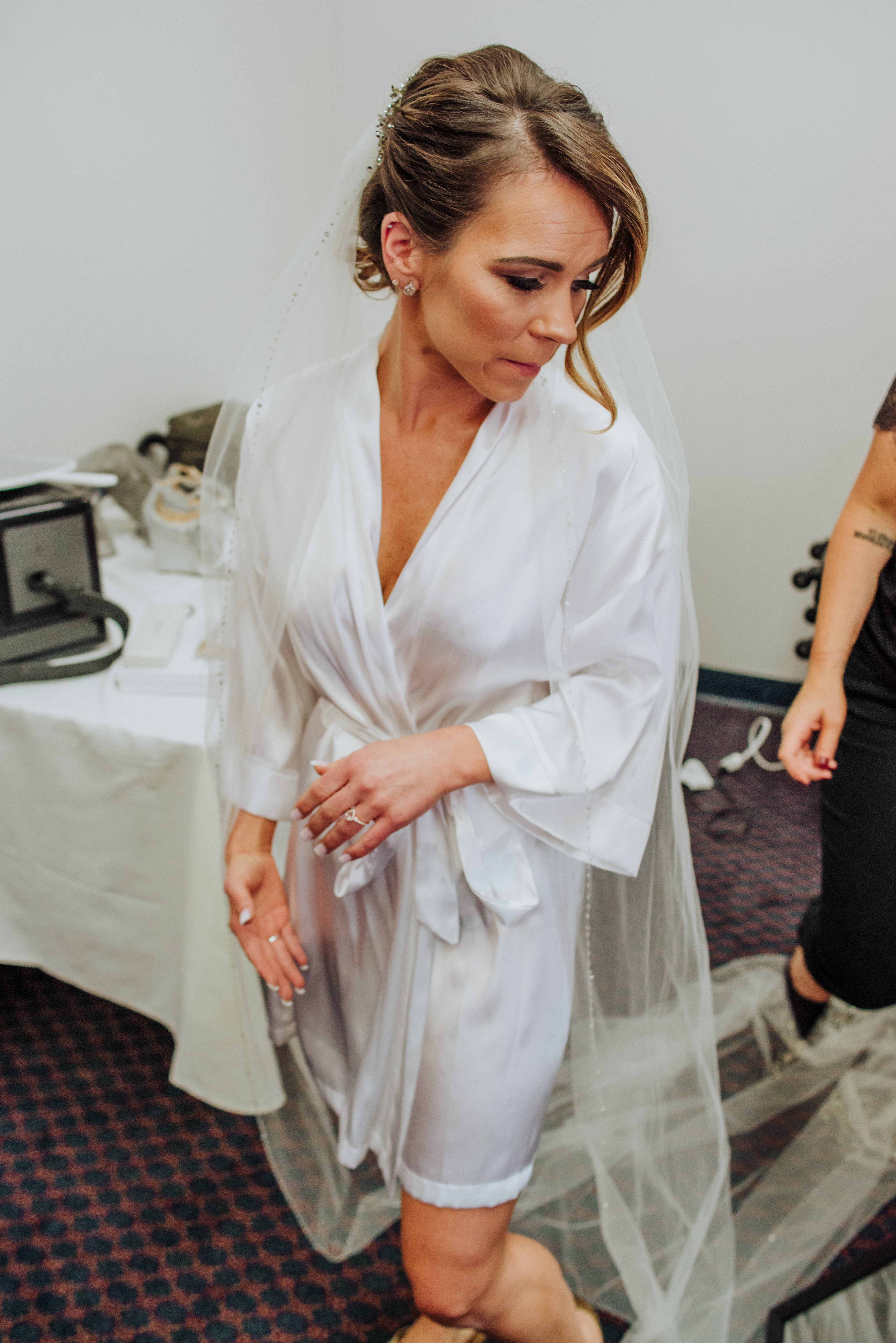 Bride getting ready with veilat a Romantic Style San Diego Wedding at Marina Village by Kylie Rae Photography
