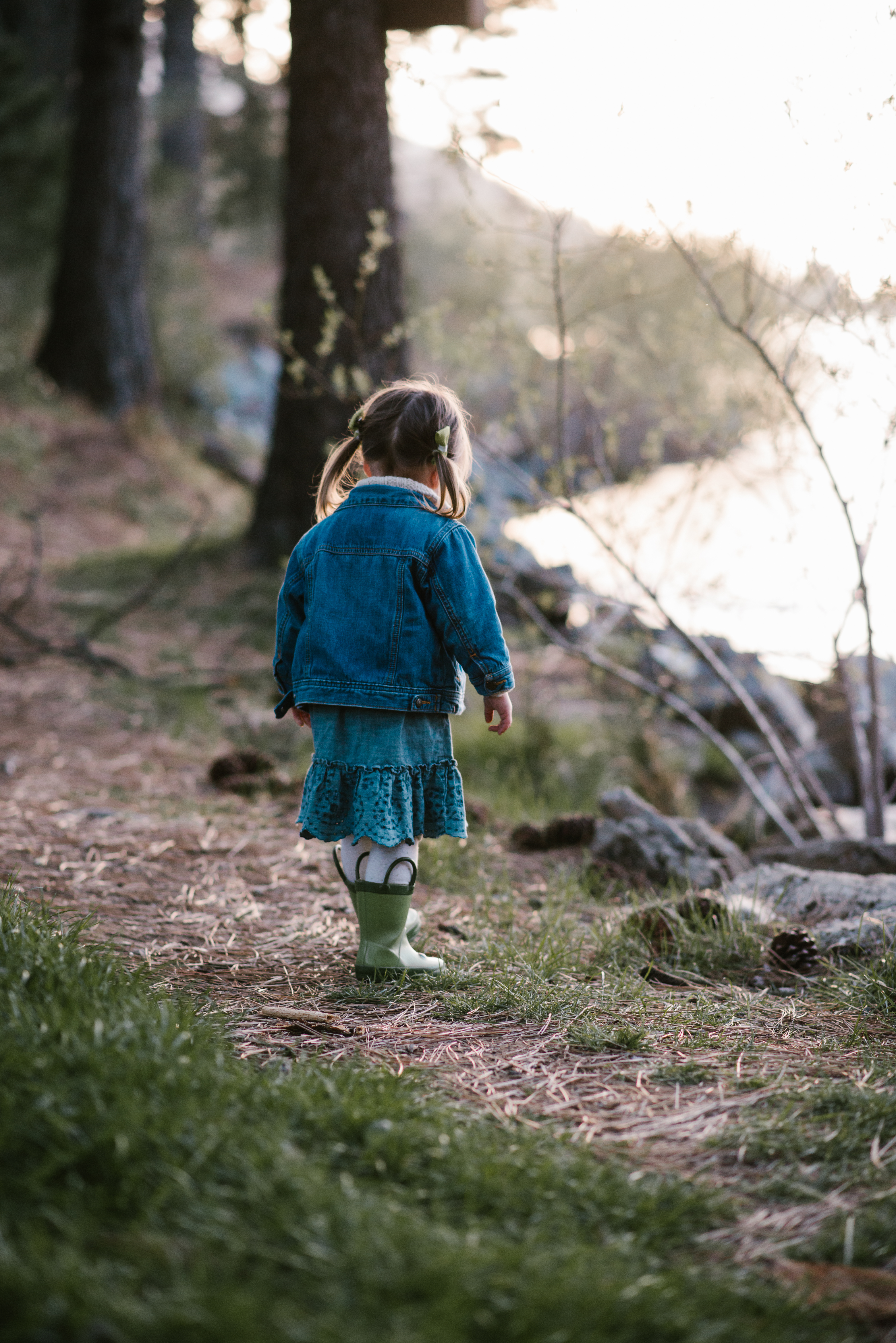 Little girl with rain bootsat a Family Session at Lake Cuyamaca by Kylie Rae Photography