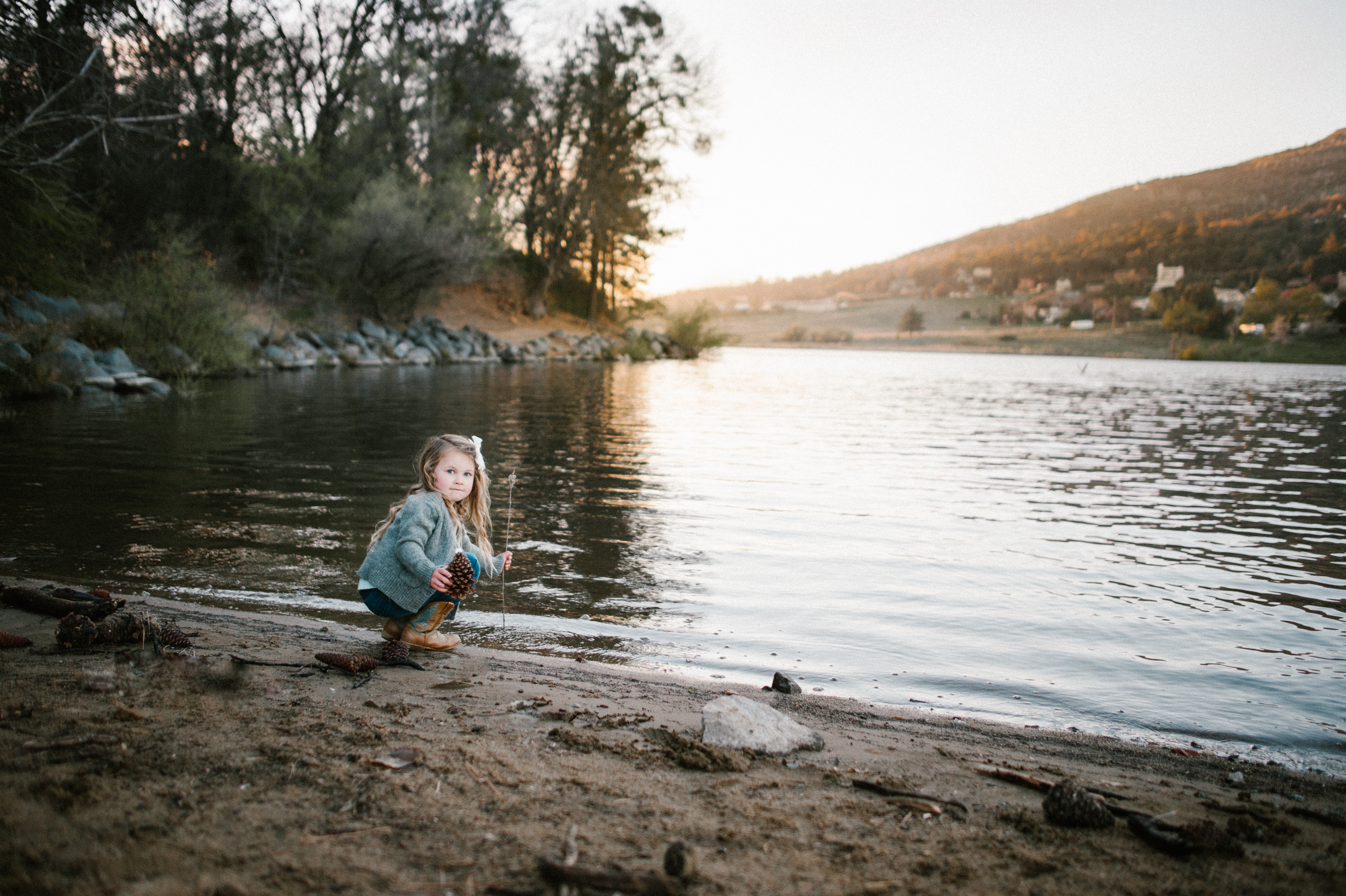 Playing in the Lakeat a Family Session at Lake Cuyamaca by Kylie Rae Photography