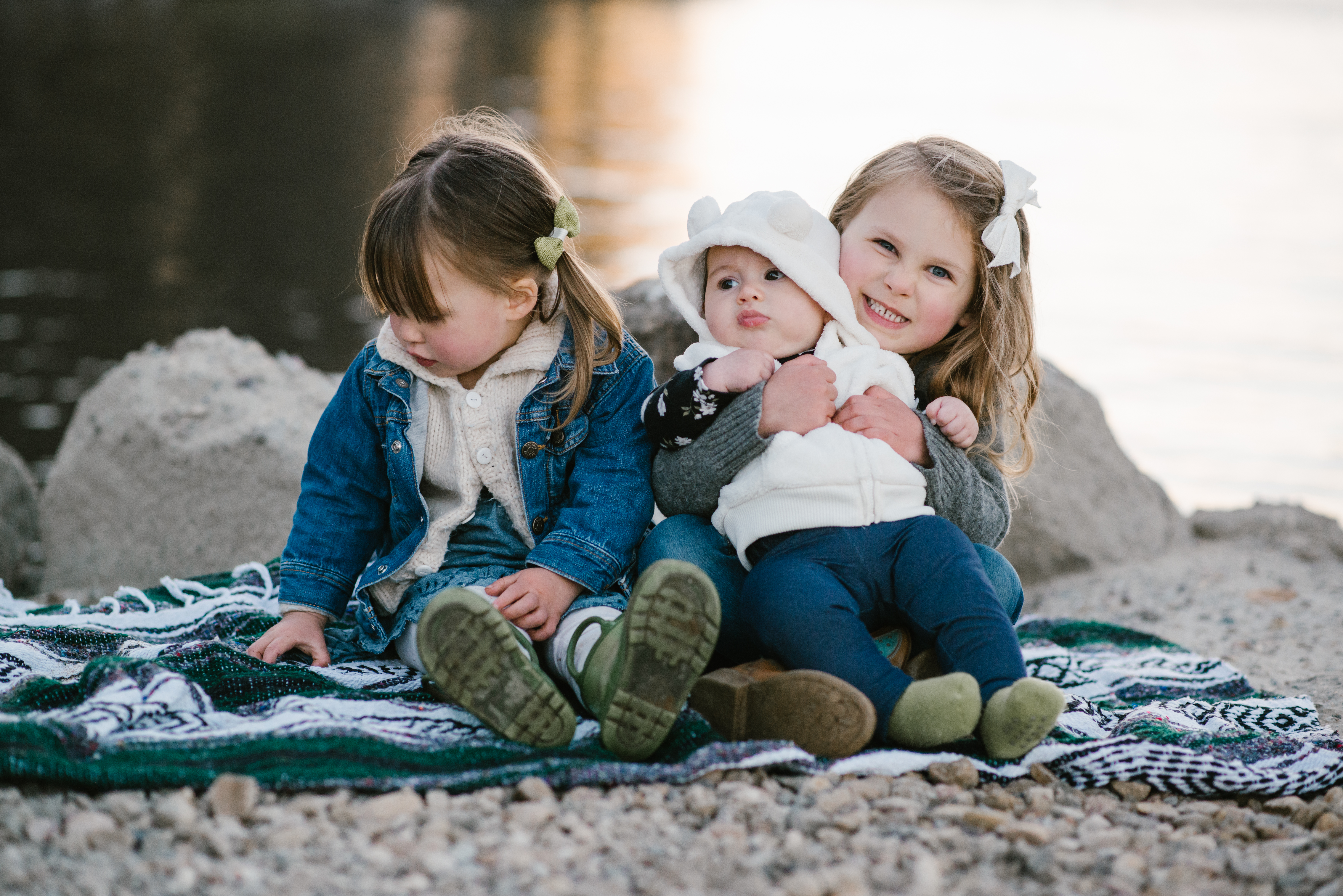 Sibbling cuddlesat a Family Session at Lake Cuyamaca by Kylie Rae Photography