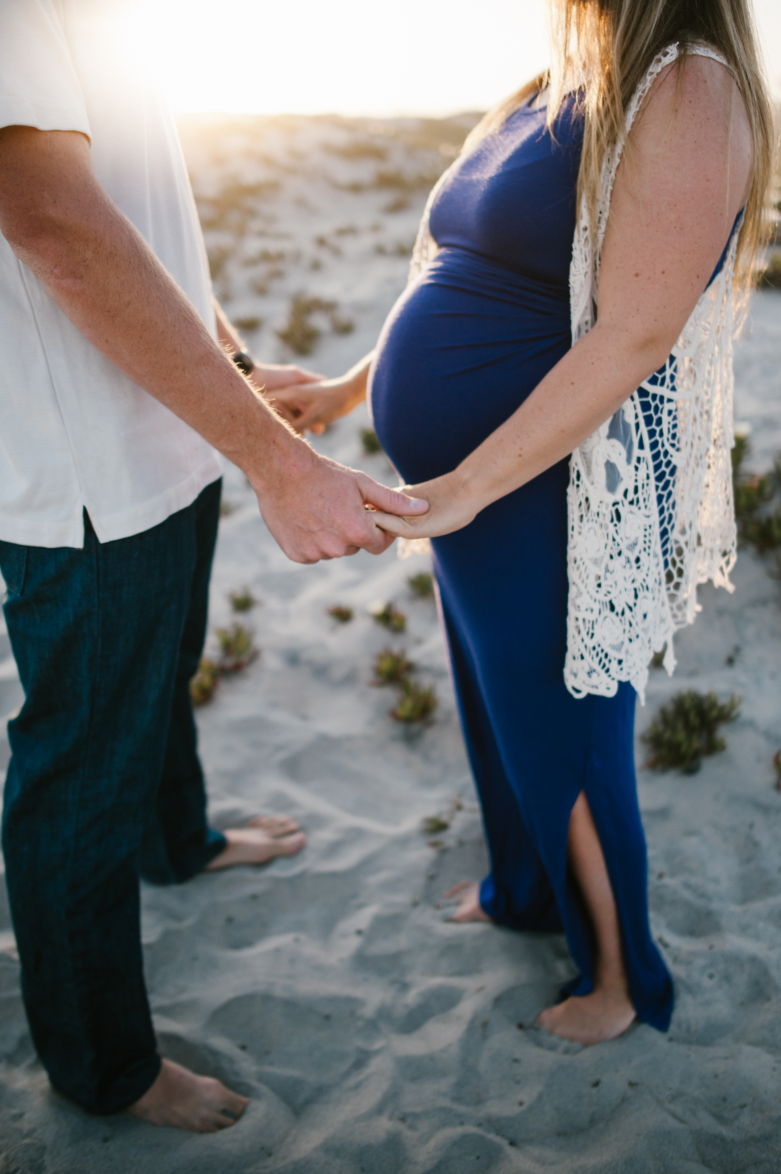 Hand holdingfamily session at Coronado Beach by Kylie Rae Photography