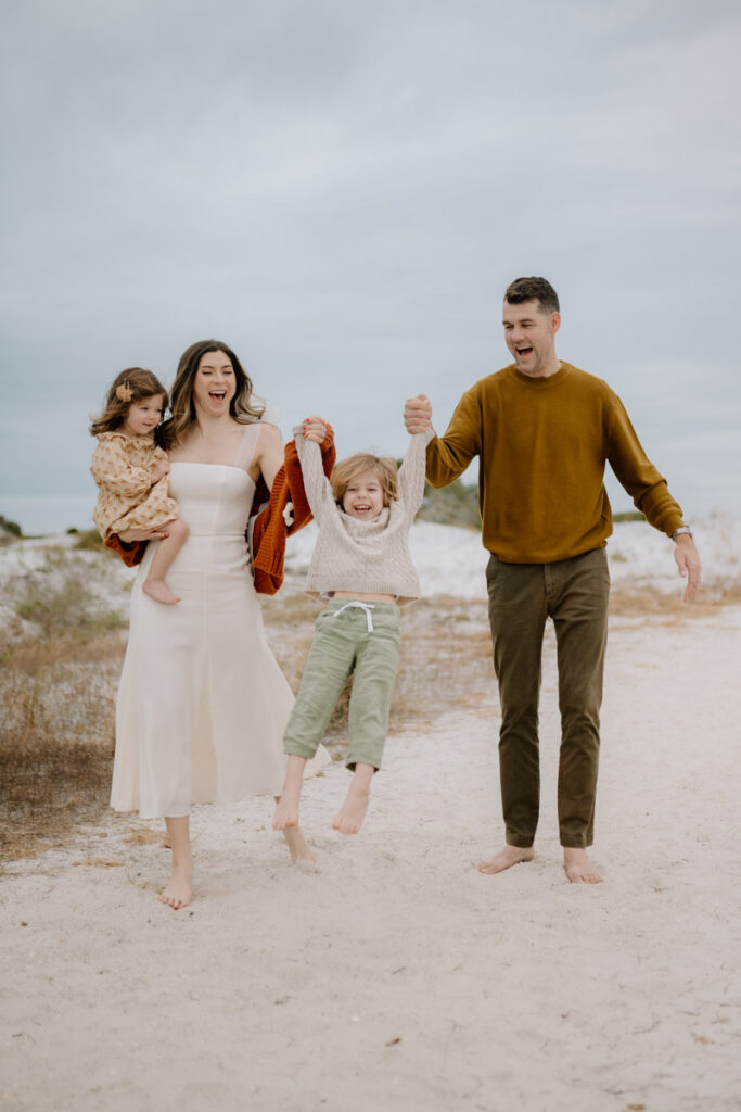 family photography on Santa Rosa Beach florida's white sandy beachces
