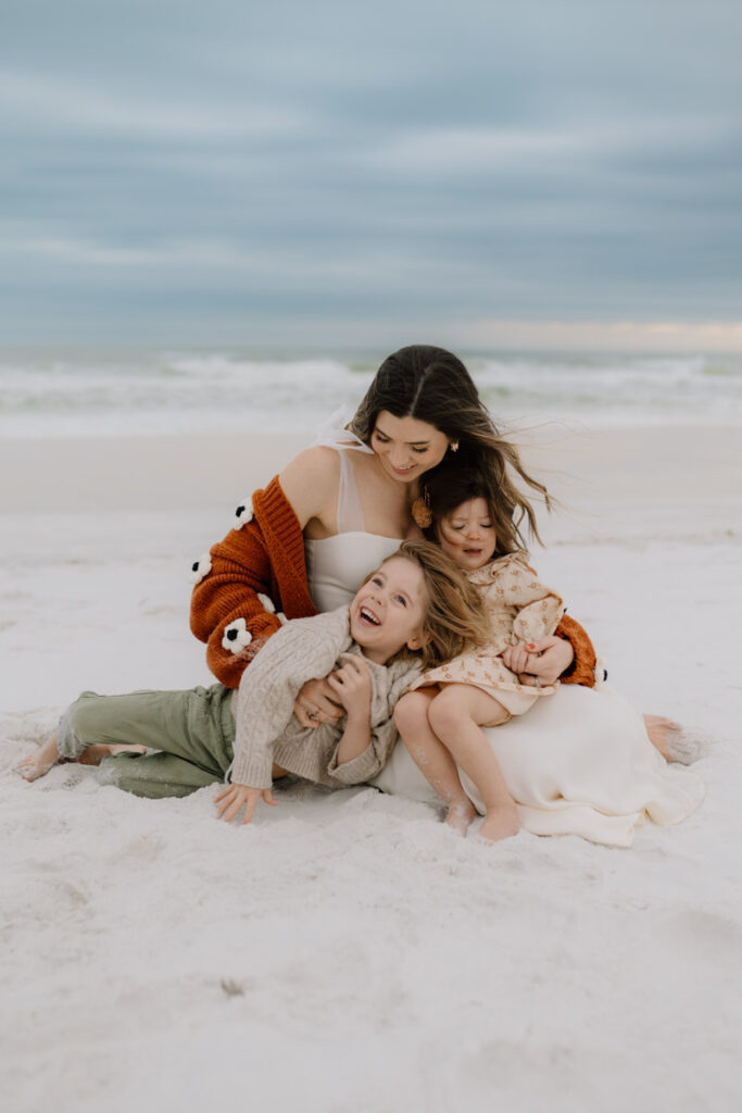 family photography on Santa Rosa Beach florida's white sandy beachces